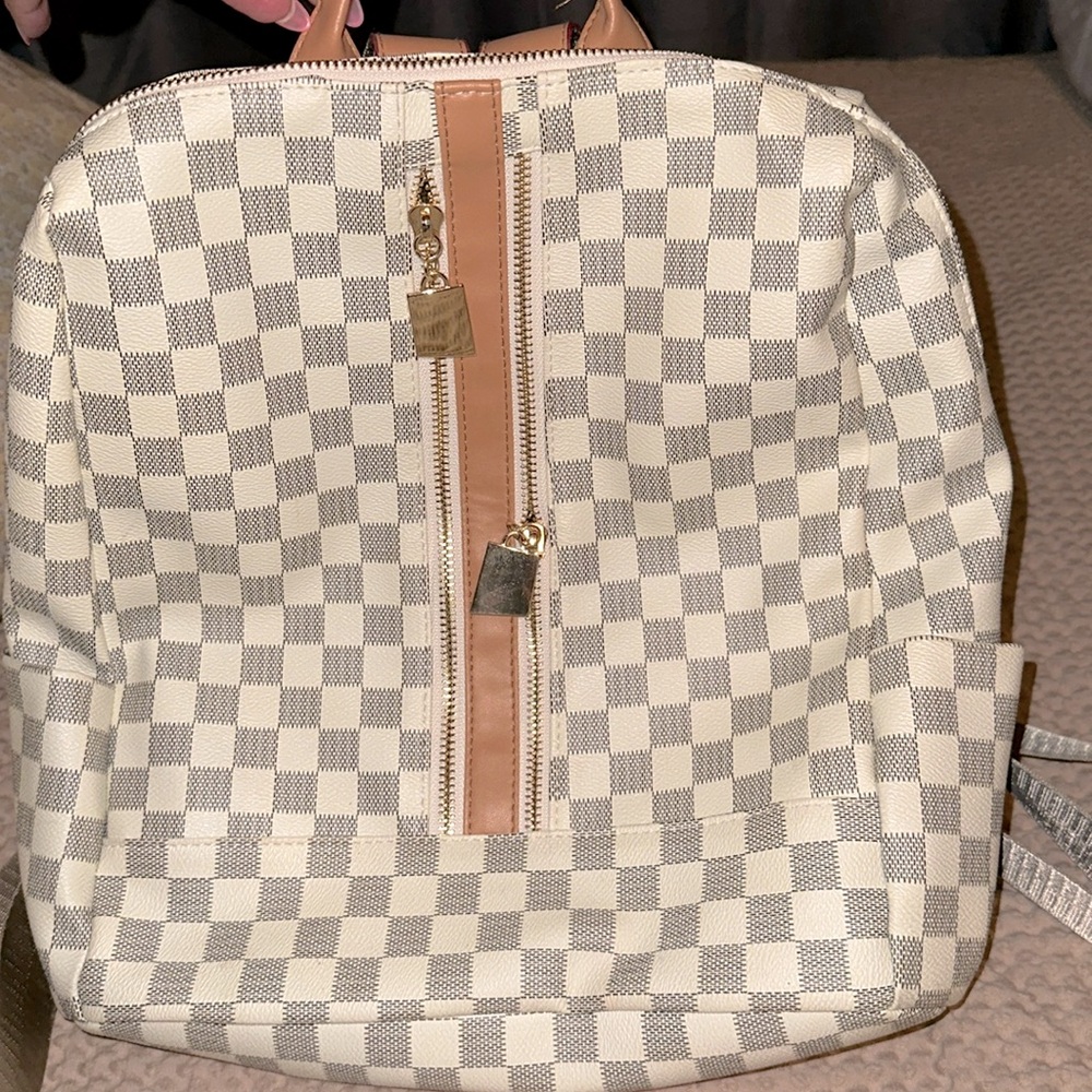 Brand new mini backpack.